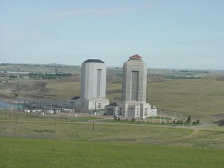 The very large Ft. Peck dam power plants jut skyward from the prairie