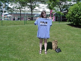 Theresa models her anniversary T-shirt and key fob!