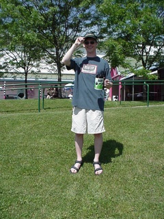 Brian shows off his anniversary hat and mug!