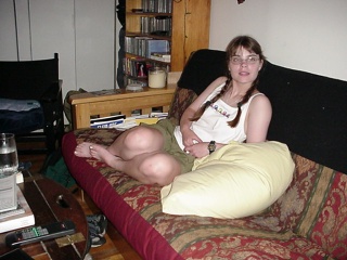 Theresa finds a comfortable spot in Michael and Cody's apartment