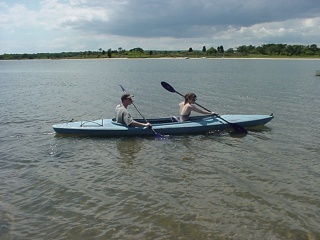 Brian and Theresa take Scott and Stacey's kayak for a spin. They mastered paddling in unison immediately