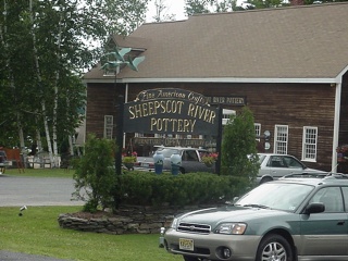 Gold lettering on signs is used all along the Maine coast line to indicate that the expected social status of customers is high. In the "township" of Camden, it was used on every sign