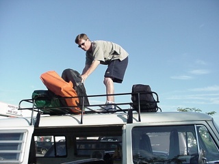 Off the roof and inside it goes, our latest mechanic doesn't appear to work in the best area of Maryland...
