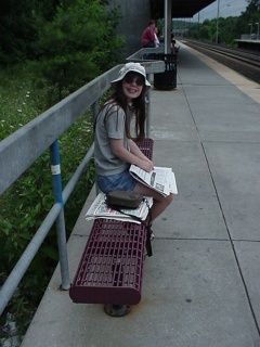 Theresa, in full tourist hat regalia, preparing to catch a train to Washington D.C.
