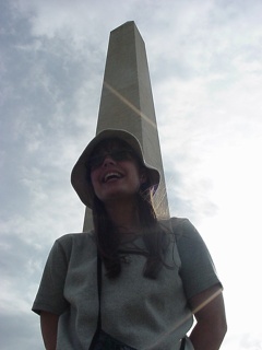 Theresa laughing at Brian's artistic side in front of this really tall building we found