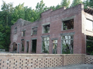 A kudzu infested building in the nearly dead section of Highway One just before leaving Georgia into Florida. It looks like I-95 shut down many towns along this stretch of road