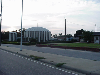 A church in Biloxi, with what we believe was a clamshell roof. Kind of a contrast to those New England churches, we think