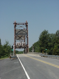 A rusty old drawbridge on the wrong way into New Orleans