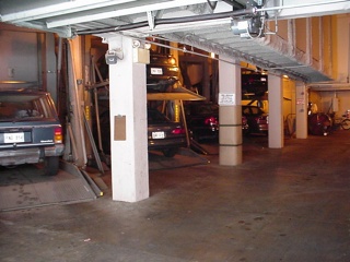 We thought we'd capture this for our western spectators. On the eastern half of the country parking is such a hot commodity they stack cars in garages.