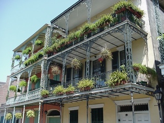 More supported decking. A large number of the decks in the French Quarter are like the section in the foreground, minus the supports to the sidewalk and minus the connectors to the section above