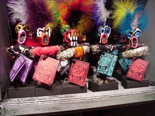 Tourist trinkets New Orleans style. Each voodoo god had it's own specialty. I believe the one on the right was to get "your woman off the couch"