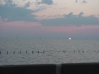 The sun rises over Lake Pontchartrain