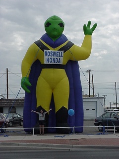 Theresa and an actual alien car salesman