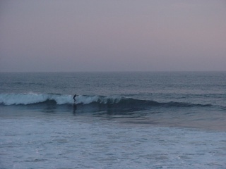 A late night surfer at Half Moon Bay