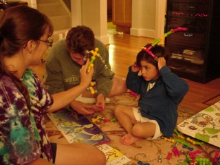 A stop at Mike and Glenda's. Theresa is taken by Adam's developmentally appropriate toys.