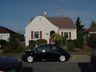 The Beetle parked out front of Mike and Glenda's very cute abode