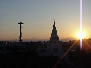 The sun setting on Seattle