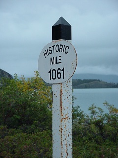 Historic mile marker, which is no longer accurate due to all of the nonsensical straightening of the road...