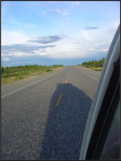 The bus casts a mighty shadow at dusk
