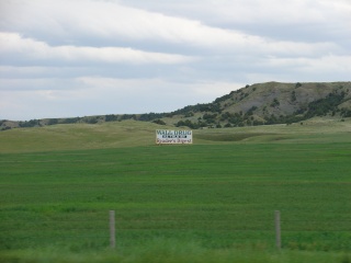 One of a hundred signs on the way to Wall Drug