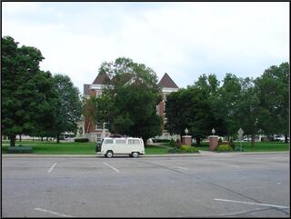 The bus sits outside the Lamar Court House