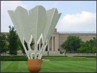 Theresa peeking out from behind an Oldenburg Shuttlecock