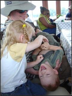 Joey, holding Jonas down for a tickling