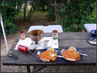 Brian whips up some gourmet camp dining. Orange food, yum!
