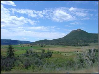 Hay bales and mountains
