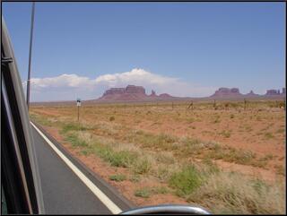 Monument Valley appears in the distance