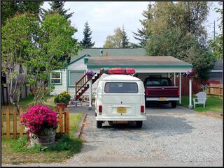 Home, the flowers seem to have thrived in our absense