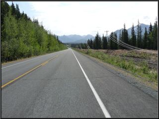 Crews stringing wires south of Tok
