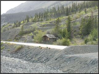 The old cabin we thought would be gone, now a side road