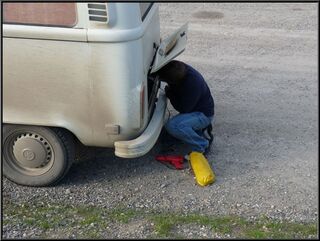 Brian setting the timing, discovering spewing gas