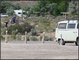 The bus, not made nervous at all by the prison work crew behind