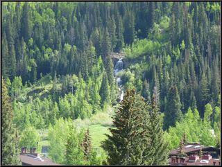 A waterfall falling into Vail