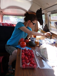 Theresa doing the storage puzzle after a great, great stop at Whole Foods