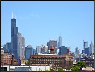 The skyline with Sears Tower. We hear they are changing its name. Really