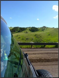 Road construction and mountain meadows near the top