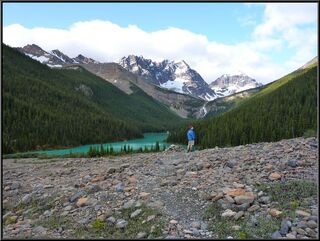 The lake at the top of the valley with an amazing waterfall just over Brian's head