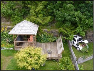 The gazebo and an amusing planter
