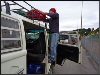 Brian re-lashing the load to the roof for the ferry