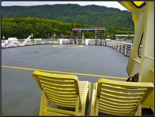 Our spot under the yellow glass of the solarium