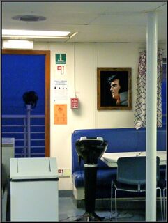 Elvis looking over the karaoke machine