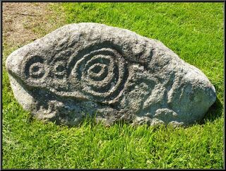 A petroglyph next to the totem