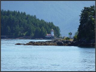 A light house across the harbor