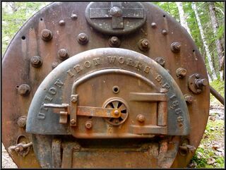 The old boiler that powered the tram over the pass