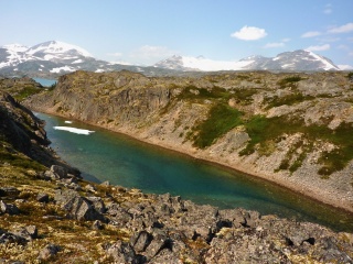 Clear snowmelt alpine pond