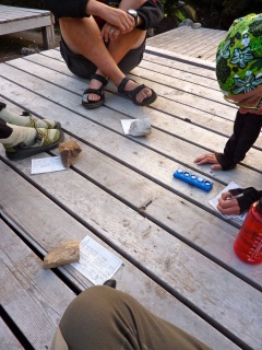 Travel Yahtzee. Brian is intrigued that Yahtzee turns out to be poker with dice