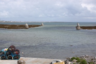 Rock beehives marking a harbor entrance.